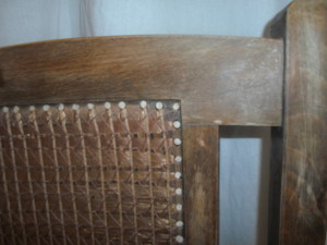 Copper-toned chair, detail